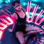 Energetic dancer in a neon-lit club with vibrant lights and futuristic vibes.